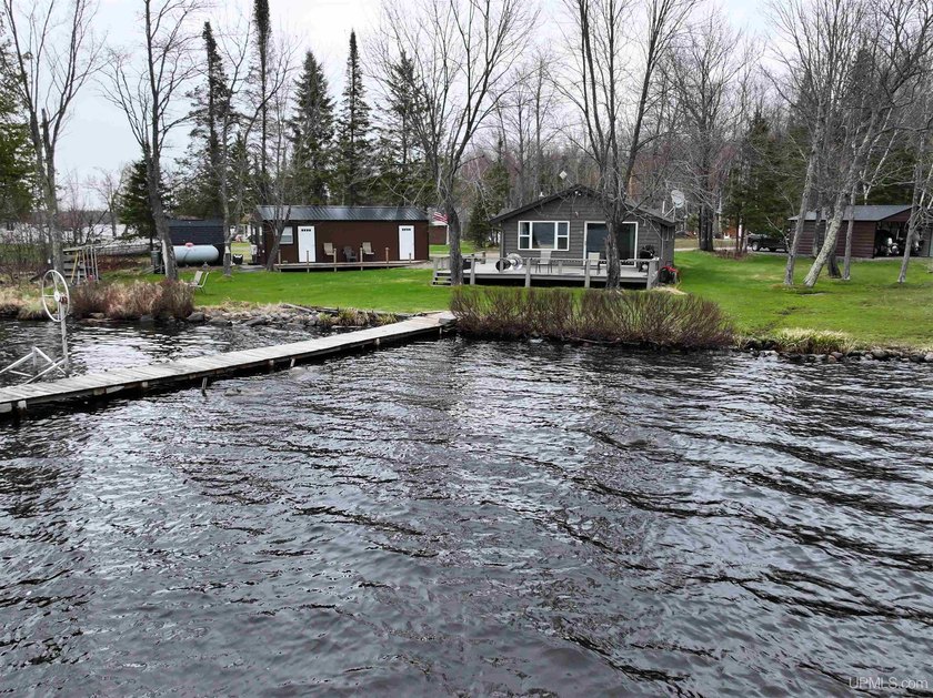 Experience true Northwoods living with this charming waterfront - photo 47