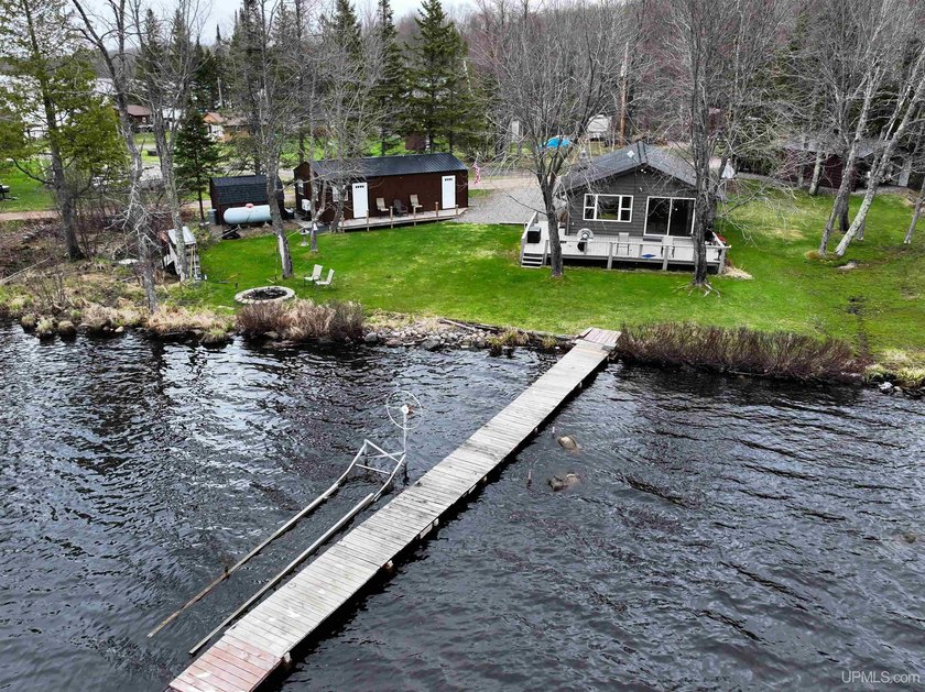 Experience true Northwoods living with this charming waterfront - photo 49
