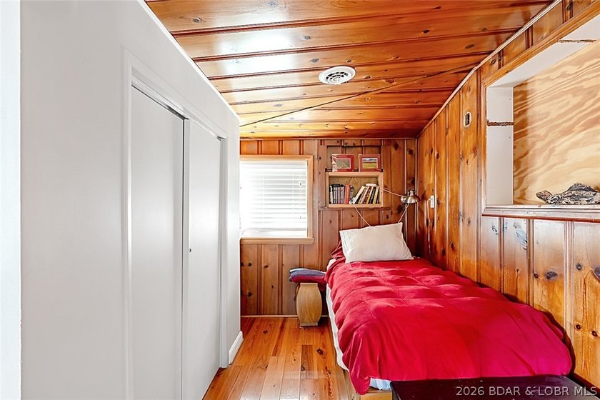 Originally a Quonset hut, this unique lakefront property blends - photo 11
