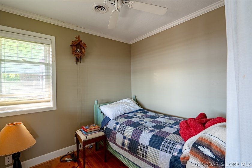 Originally a Quonset hut, this unique lakefront property blends - photo 13