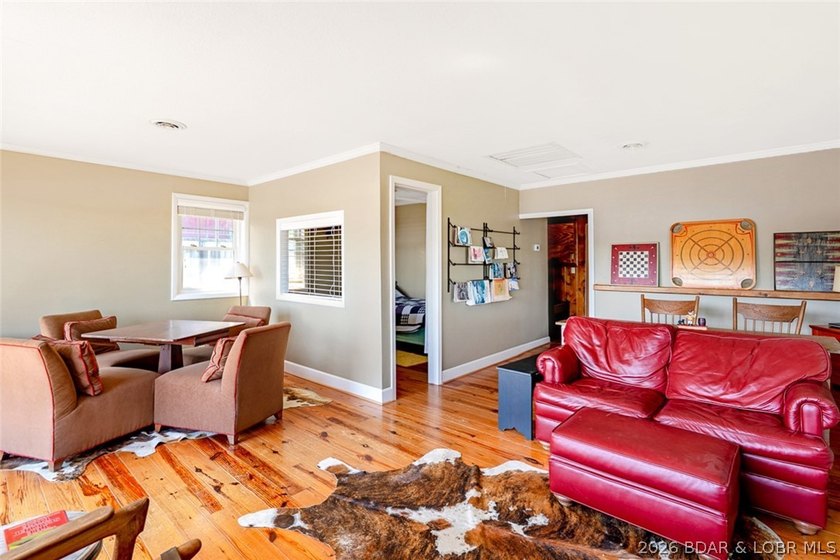 Originally a Quonset hut, this unique lakefront property blends - photo 15