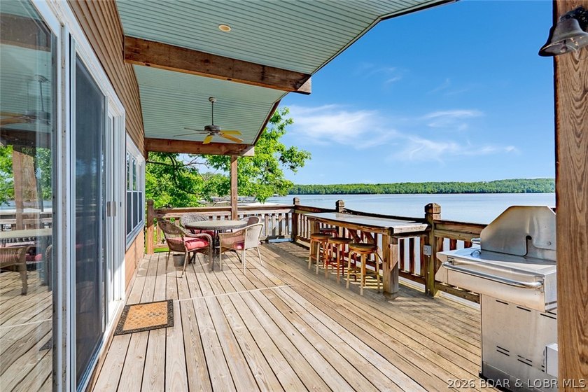 Originally a Quonset hut, this unique lakefront property blends - photo 16