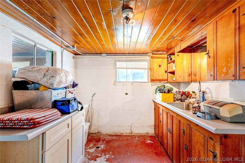 Originally a Quonset hut, this unique lakefront property blends - photo 23