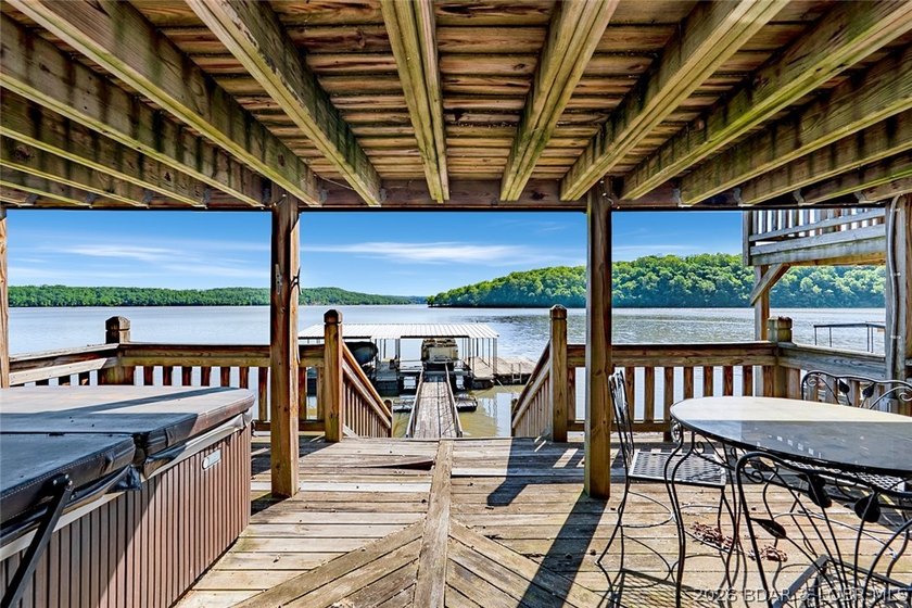Originally a Quonset hut, this unique lakefront property blends - photo 26