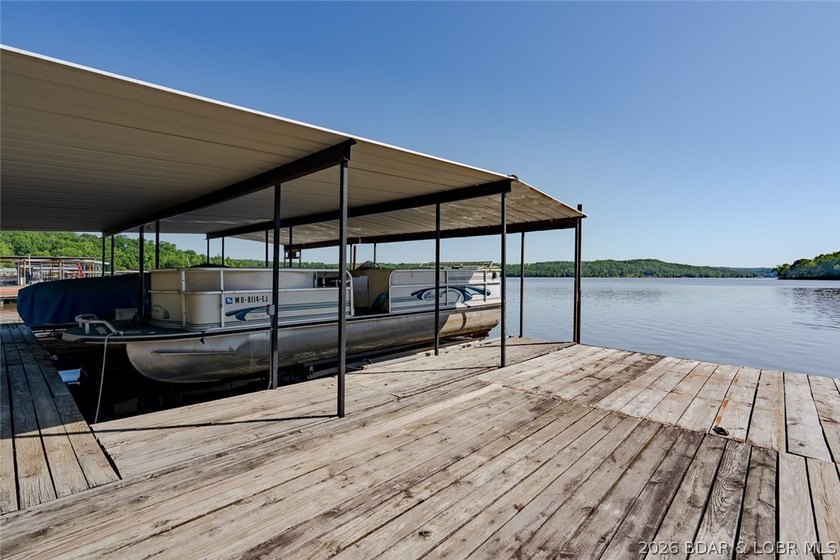Originally a Quonset hut, this unique lakefront property blends - photo 28