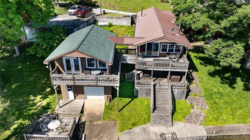 Originally a Quonset hut, this unique lakefront property blends - photo 30