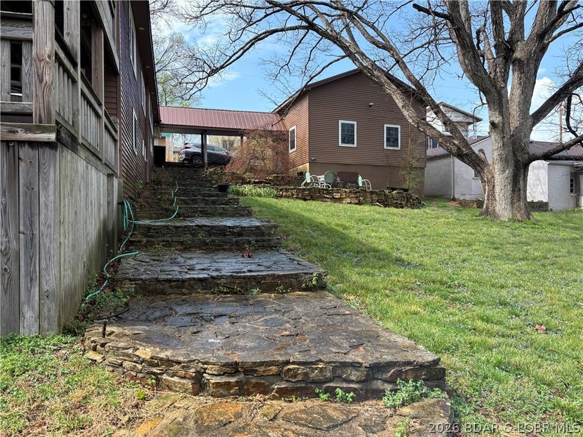 Originally a Quonset hut, this unique lakefront property blends - photo 34