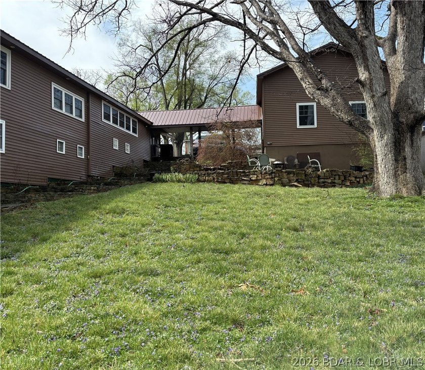 Originally a Quonset hut, this unique lakefront property blends - photo 36