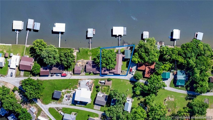 Originally a Quonset hut, this unique lakefront property blends - photo 40