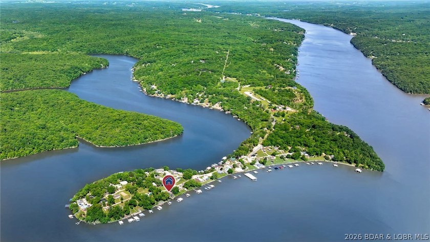 Originally a Quonset hut, this unique lakefront property blends - photo 41
