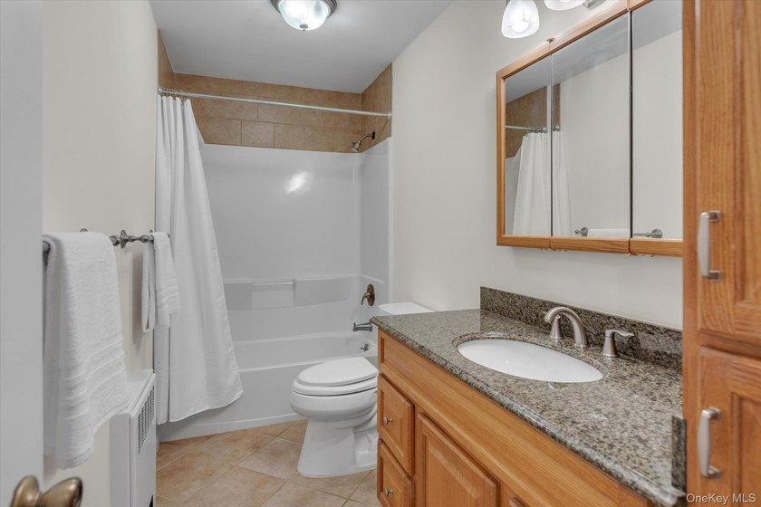 Move right into this beautifully updated split-level home - photo 12