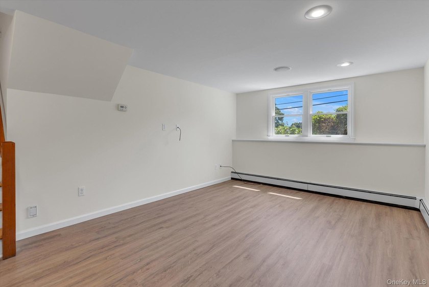 Move right into this beautifully updated split-level home - photo 17