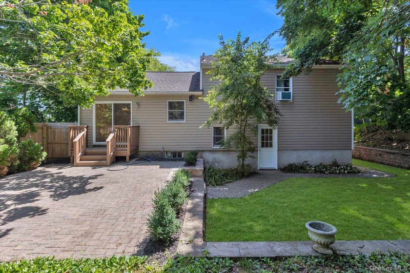 Move right into this beautifully updated split-level home - photo 21