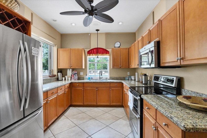 Welcome to this spacious three-bedroom, two-bath residence in - photo 33