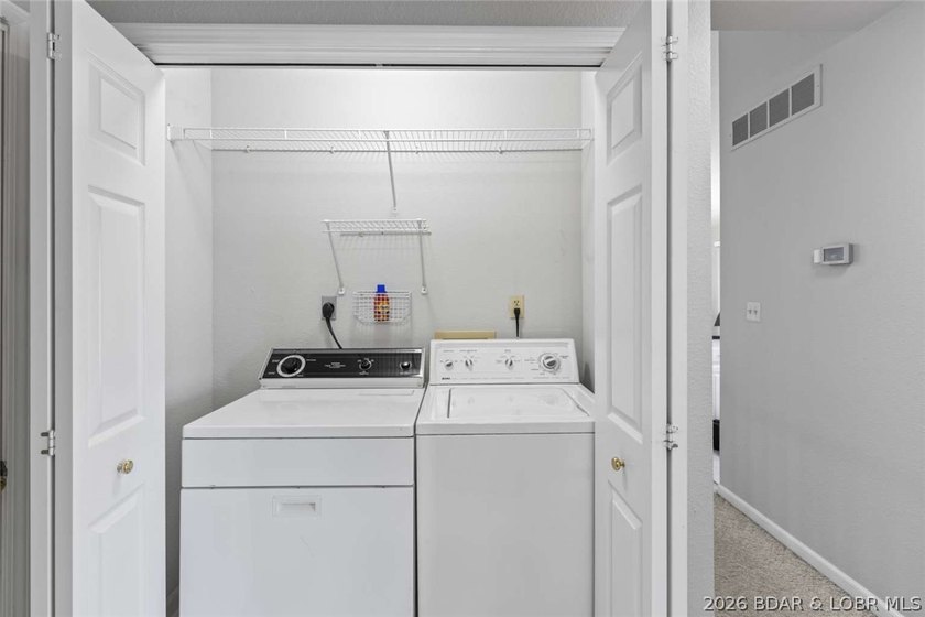 Rare lakefront gem offering a prime location by land and water - photo 14
