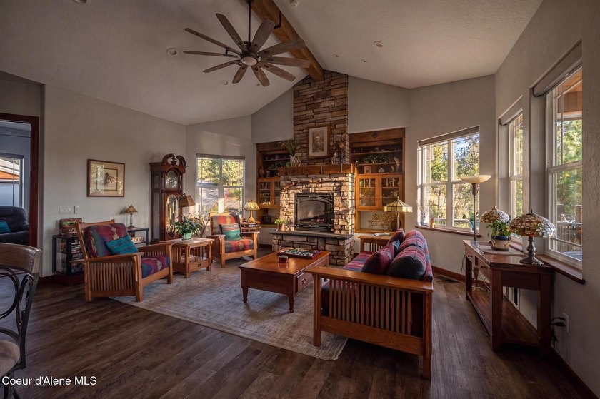 Stunning sunsets frame this custom designed Craftsman that sits - photo 18