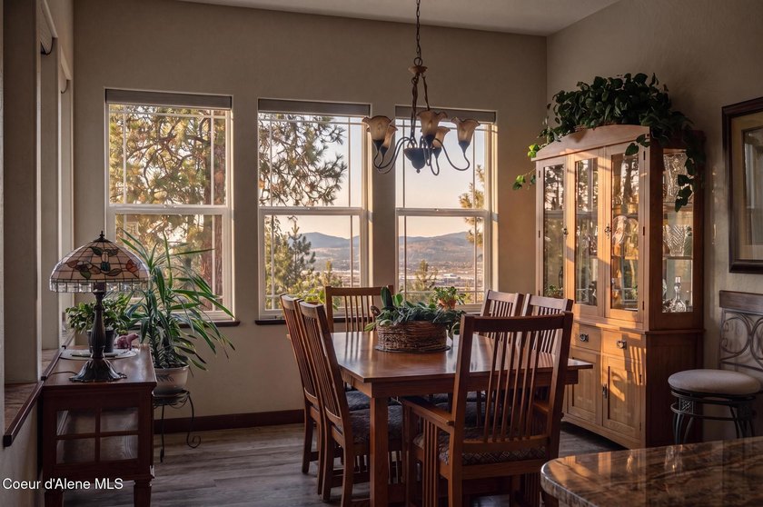 Stunning sunsets frame this custom designed Craftsman that sits - photo 21