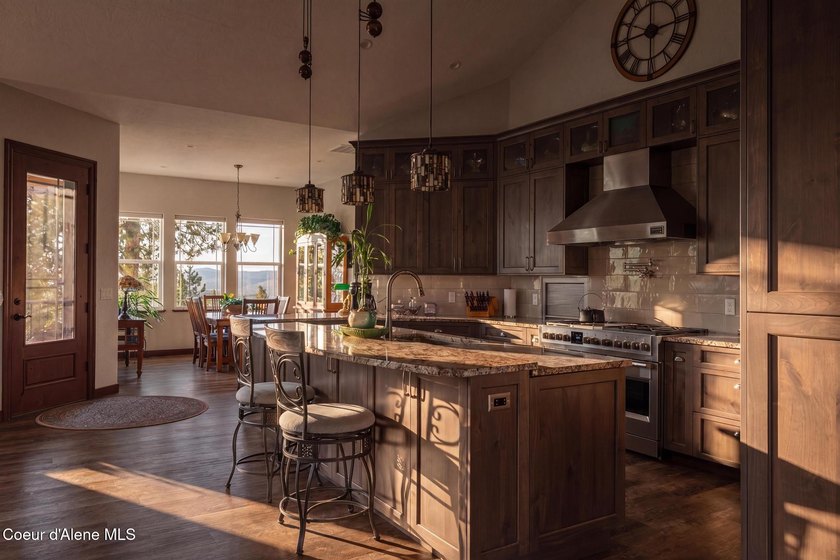 Stunning sunsets frame this custom designed Craftsman that sits - photo 23