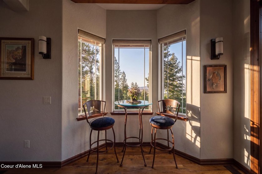 Stunning sunsets frame this custom designed Craftsman that sits - photo 30
