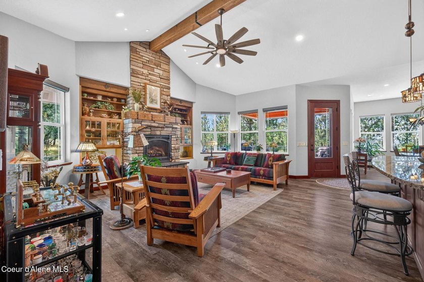 Stunning sunsets frame this custom designed Craftsman that sits - photo 41