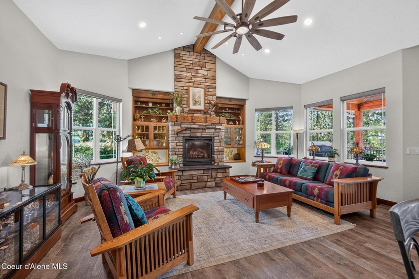 Stunning sunsets frame this custom designed Craftsman that sits - photo 42