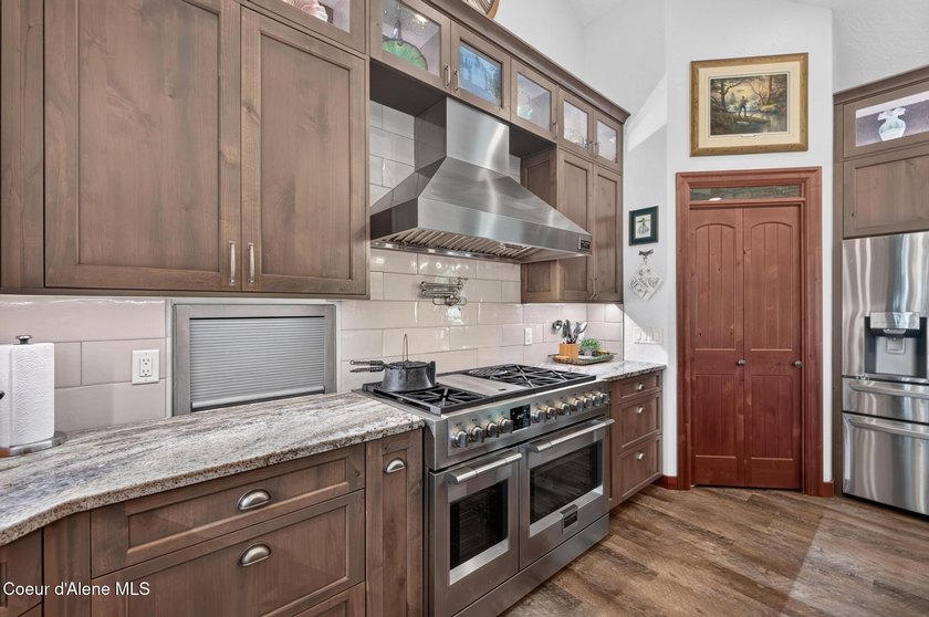 Stunning sunsets frame this custom designed Craftsman that sits - photo 49