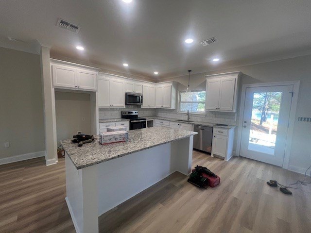 ON THE WATER!!! This beautiful new construction home offers a - photo 11