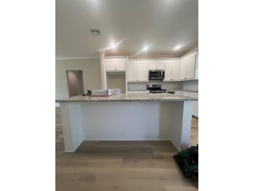 ON THE WATER!!! This beautiful new construction home offers a - photo 15