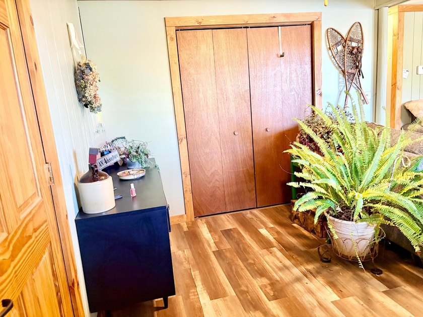 Set on a beautifully wooded 1.7-acre lot with 393 feet of sandy - photo 29