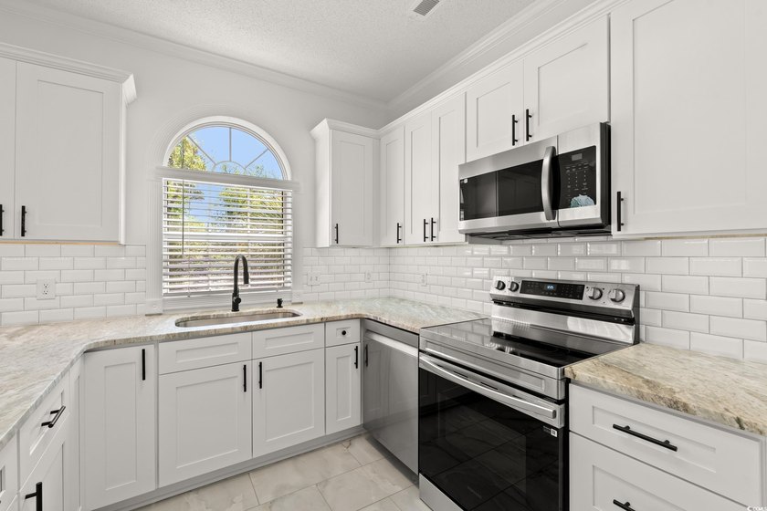 Don't miss this rare opportunity to own a completely renovated - photo 12