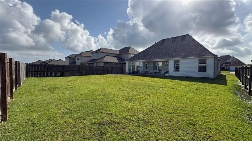 Welcome home to this modern Acadian-style construction, open - photo 22