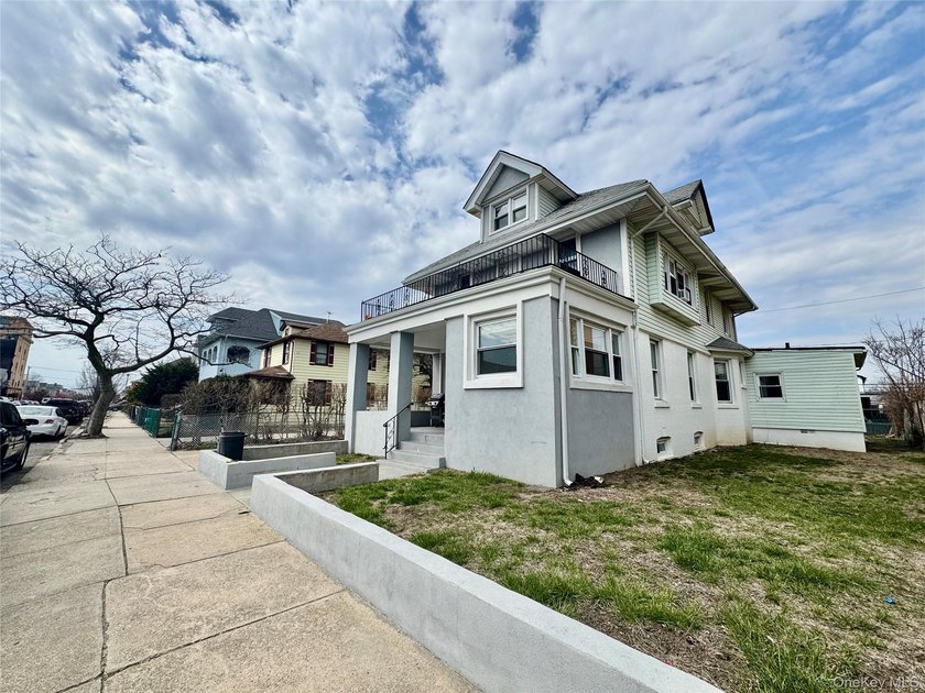 Welcome to this income-producing residential property in the - photo 2