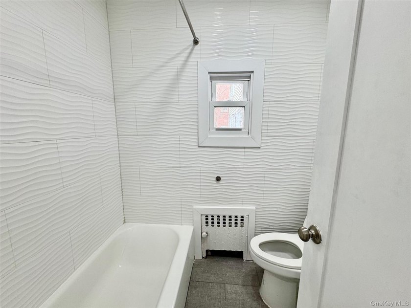 Welcome to this income-producing residential property in the - photo 9