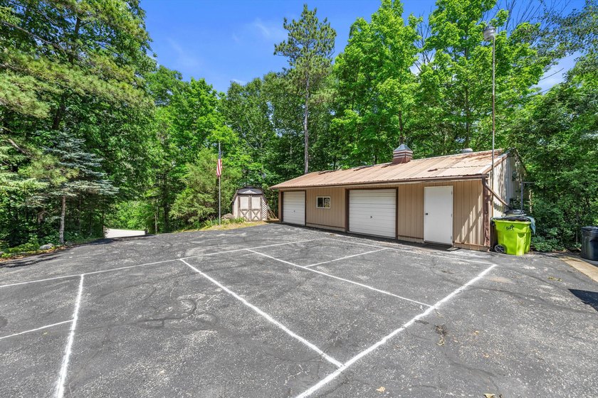 Unique property tucked away on a private wooded lot in a quiet - photo 6