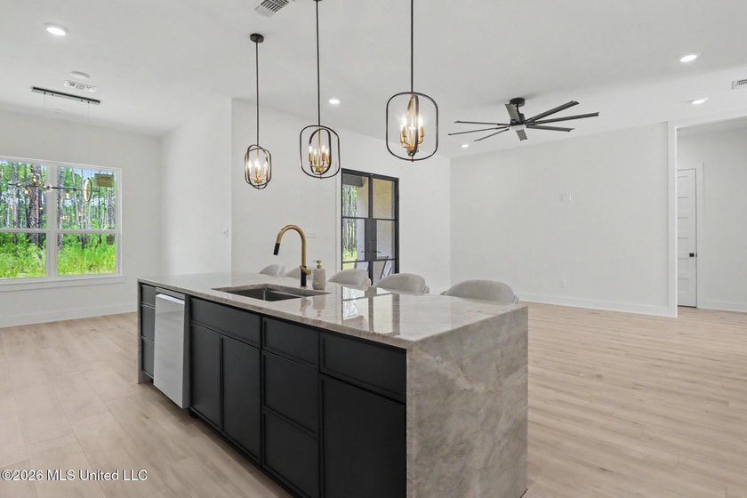Welcome to this stunning custom-built 2025 home, where modern - photo 14