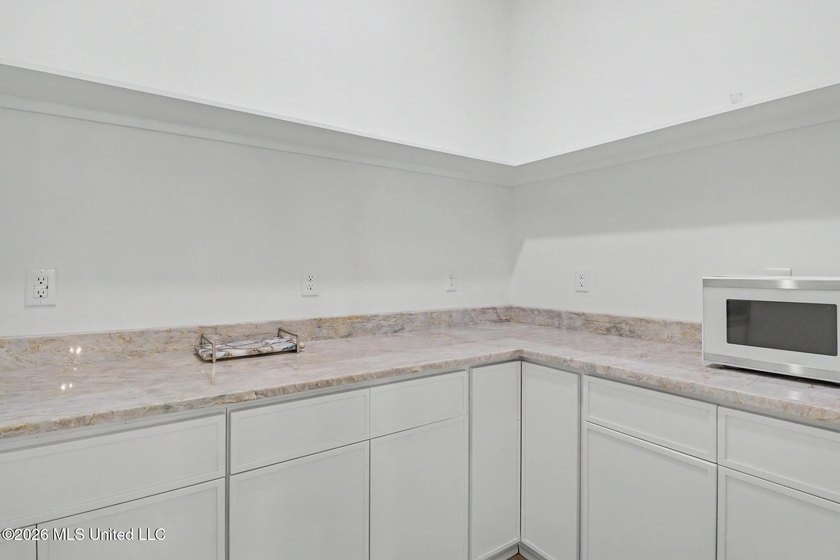 Welcome to this stunning custom-built 2025 home, where modern - photo 15