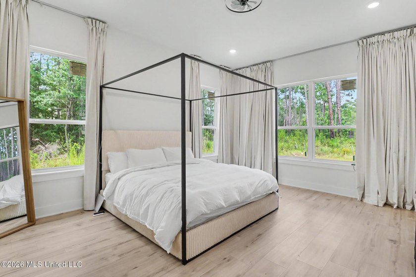 Welcome to this stunning custom-built 2025 home, where modern - photo 16