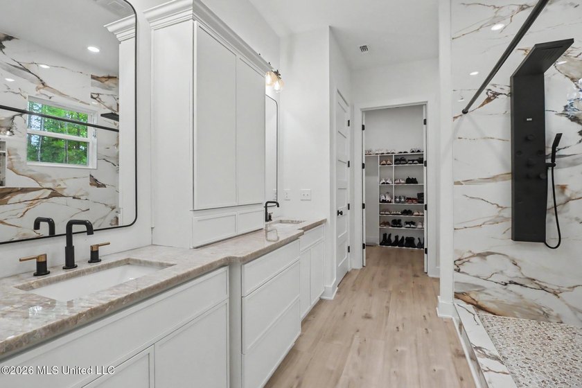 Welcome to this stunning custom-built 2025 home, where modern - photo 18