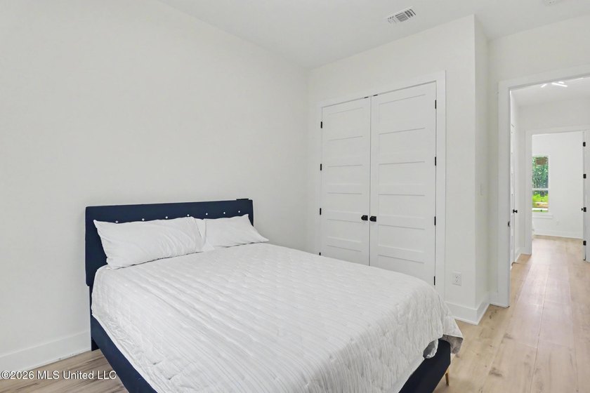 Welcome to this stunning custom-built 2025 home, where modern - photo 26