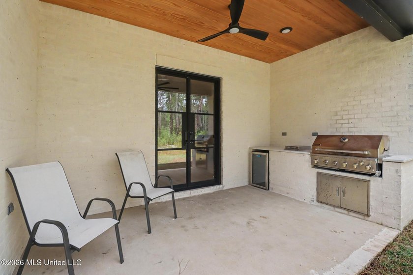 Welcome to this stunning custom-built 2025 home, where modern - photo 34