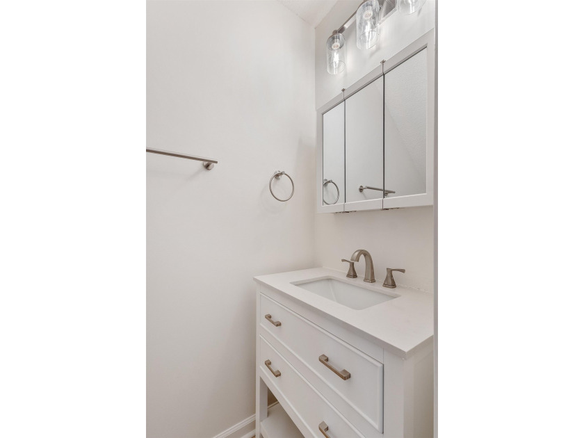 Nestled in a quiet, tucked-away neighborhood within the highly - photo 12