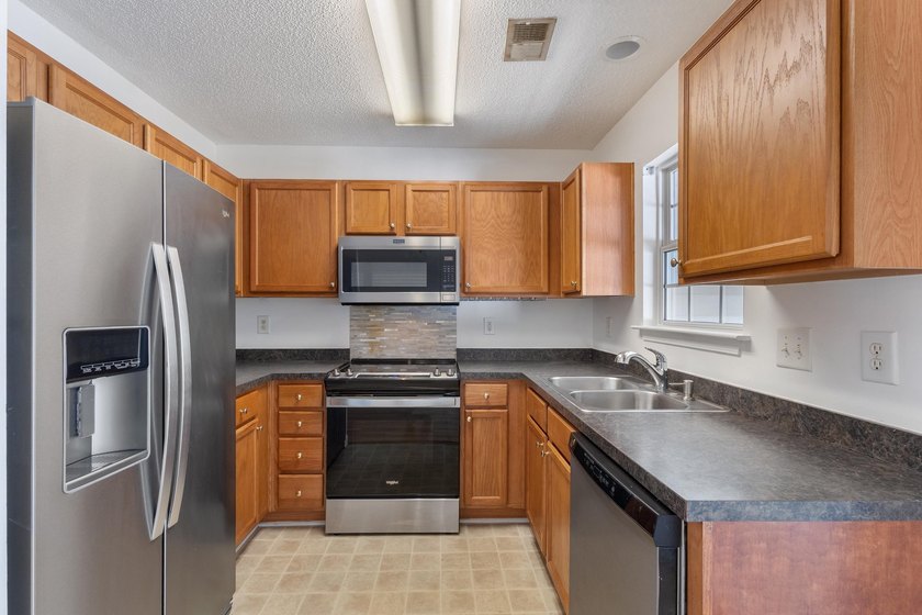 Nestled in a quiet, tucked-away neighborhood within the highly - photo 20