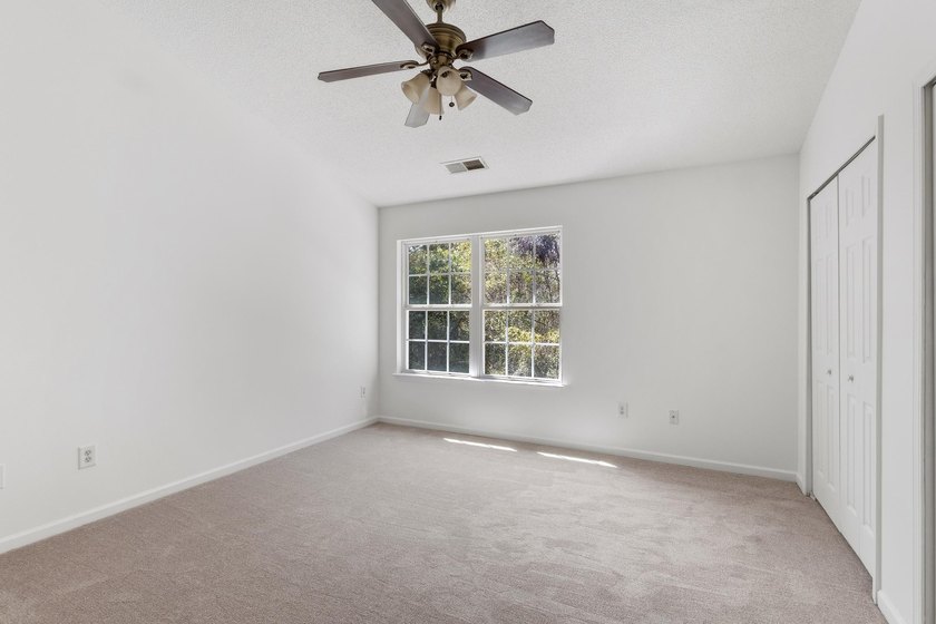 Nestled in a quiet, tucked-away neighborhood within the highly - photo 27