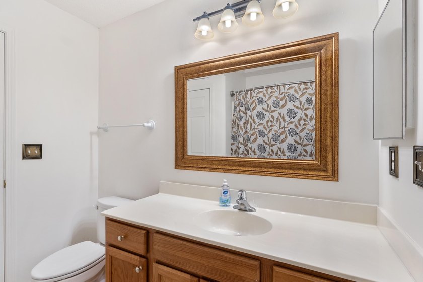 Nestled in a quiet, tucked-away neighborhood within the highly - photo 28