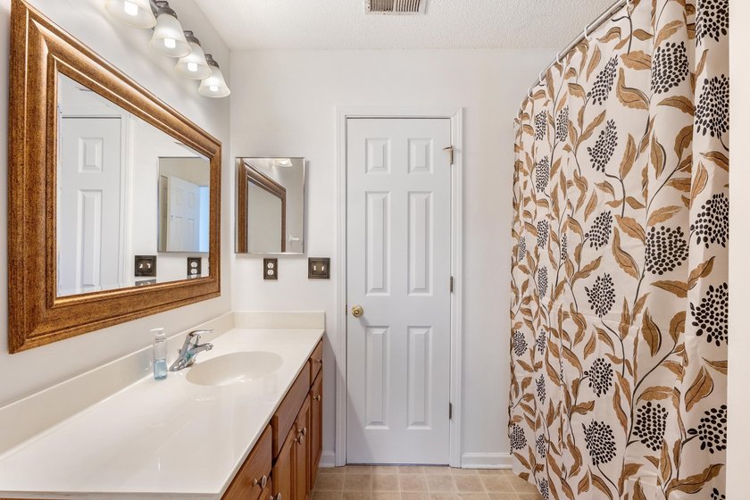 Nestled in a quiet, tucked-away neighborhood within the highly - photo 29