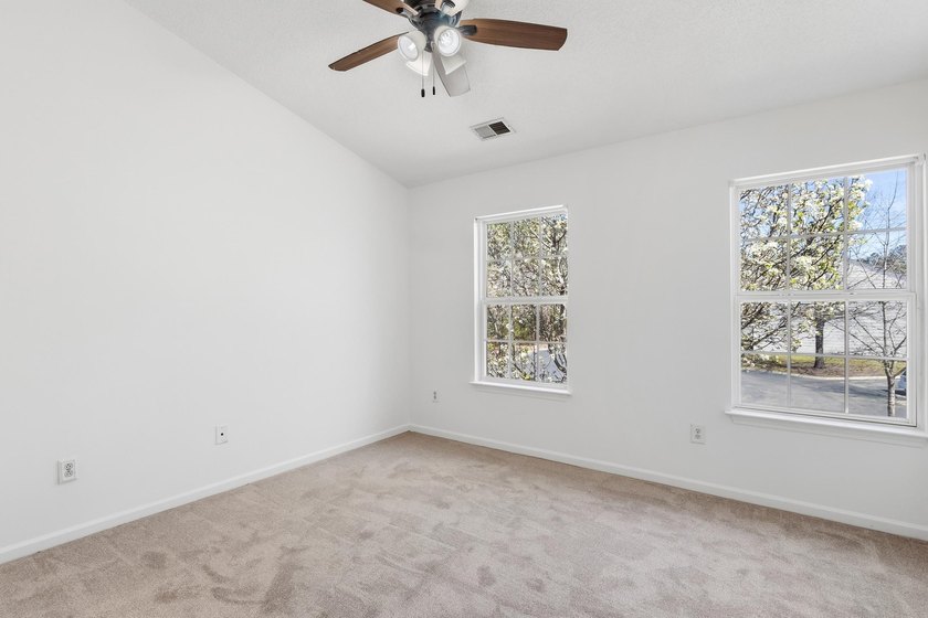 Nestled in a quiet, tucked-away neighborhood within the highly - photo 30