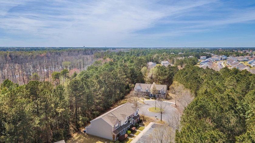 Nestled in a quiet, tucked-away neighborhood within the highly - photo 38