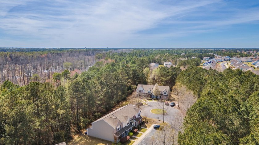 Nestled in a quiet, tucked-away neighborhood within the highly - photo 39