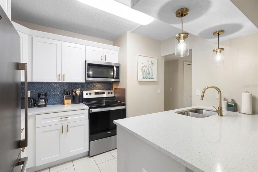 Beautifully Renovated Condo offers a perfect blend of modern - photo 12