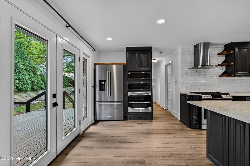 Completely reimagined and beautifully renovated, this stunning - photo 15